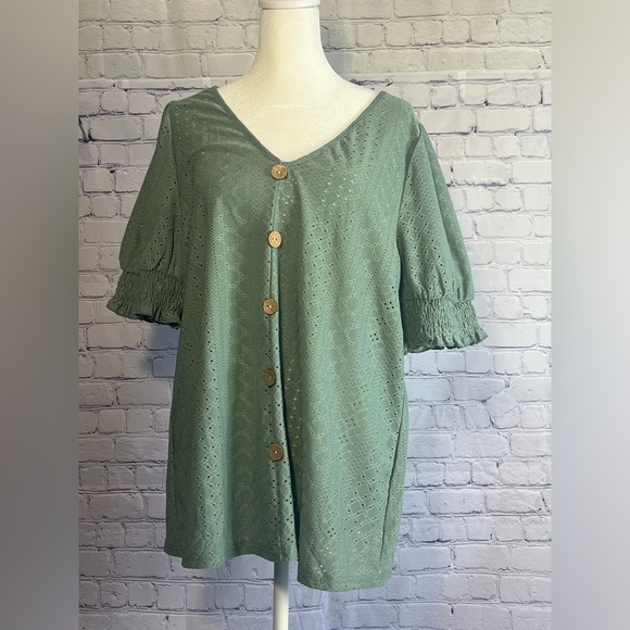 BloomChic Tops - Bloomchic laser cut top smocked sleeves decorative buttons stretchy